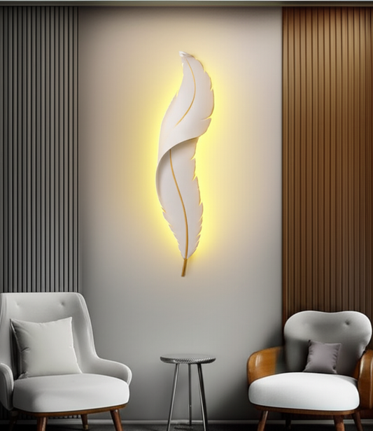 Modern interior with two chairs and a unique wall light fixture.